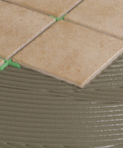CEMENT BINDERS FOR LAYING ON TILES OVER A SEPARATING LAYER IN INTERIORS
